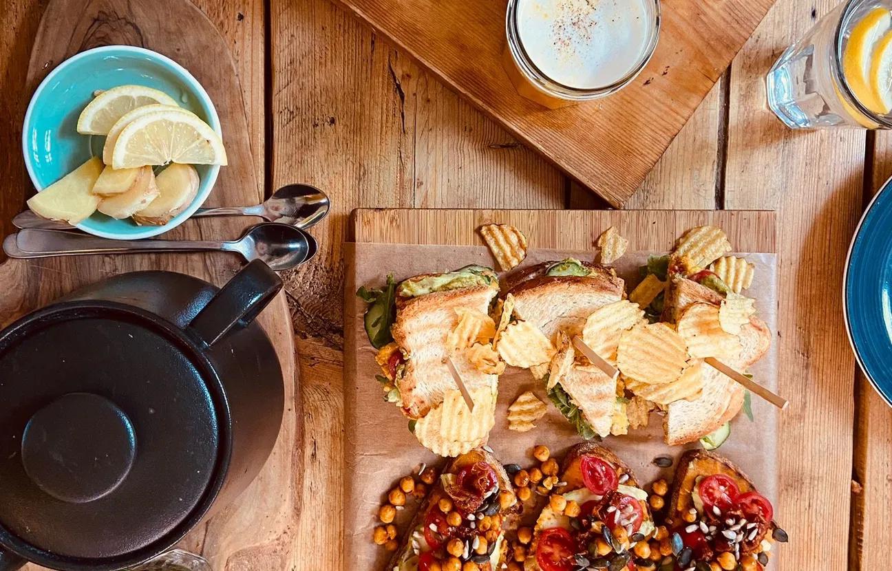 Covered table with sweet and savoury treats